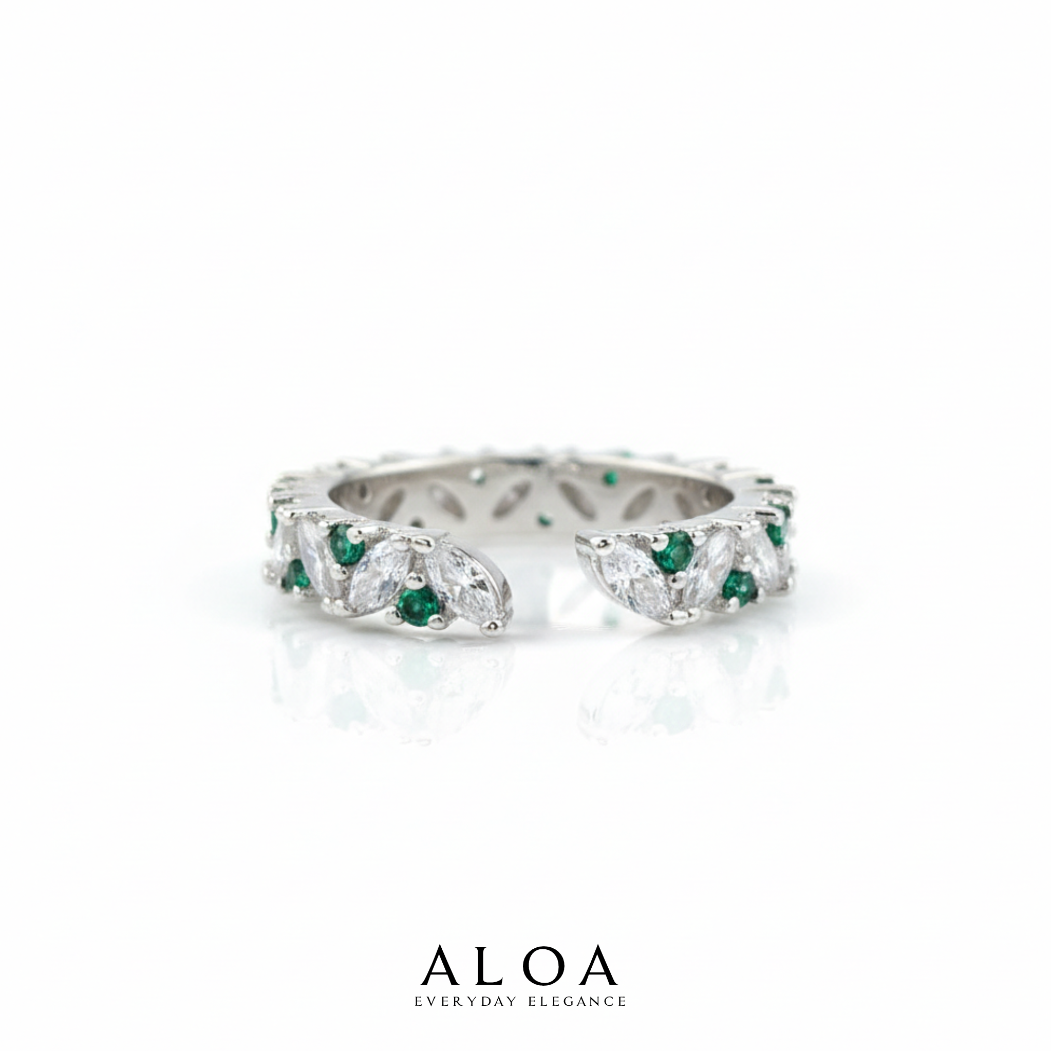 Silver ring with green gemstones on a white background, featuring the brand 'ALOA'.